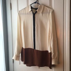 Cream, brown and black blouse.